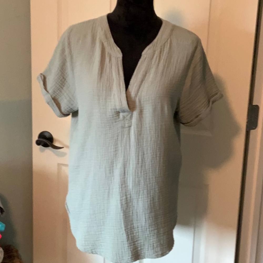 Brand new never worn size med crinkle material in sage green.